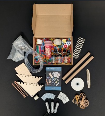 Cardboard box containing PrActiv|Ed Early Years Science Kit supplies