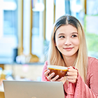 Image of student enjoying a coffee