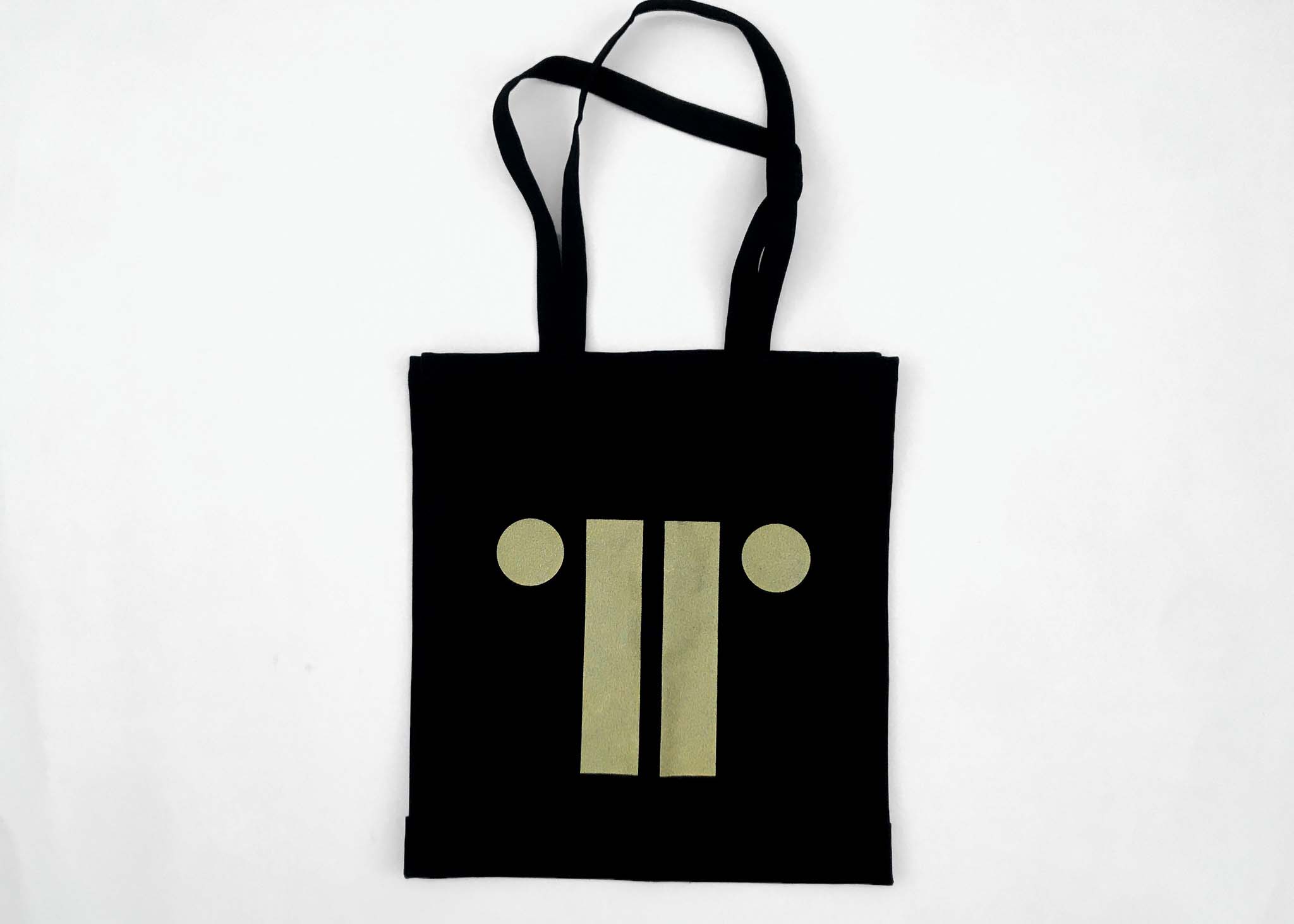 Black tote bag with gold logo