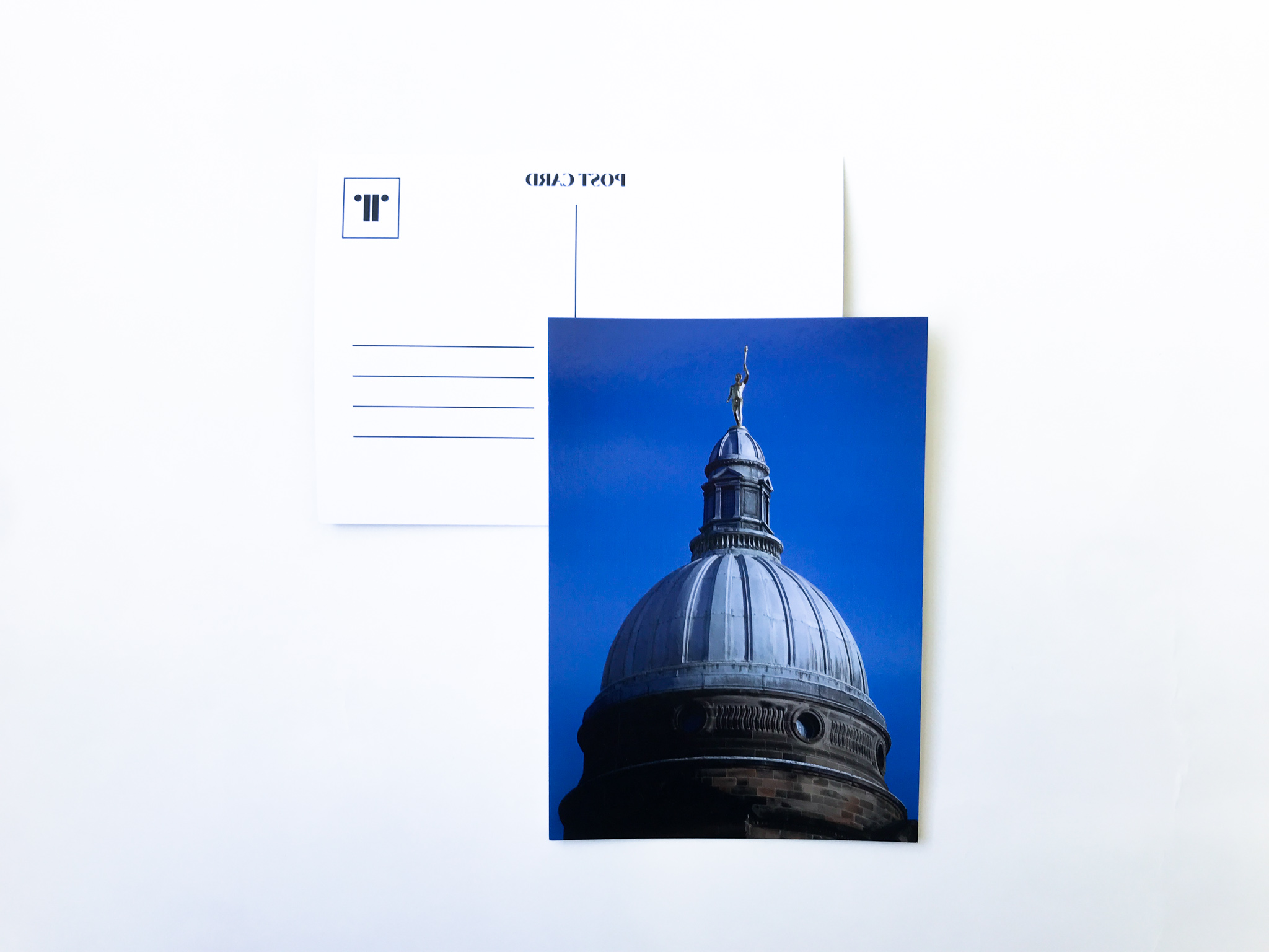 A5 postcard with image of Golden Boy statue at the top of Old College dome.
