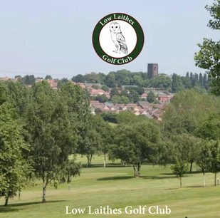 Golf Course with house roofs and church tower in background