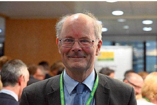 Image of Sir John Curtice with workinmg enviroment in the background