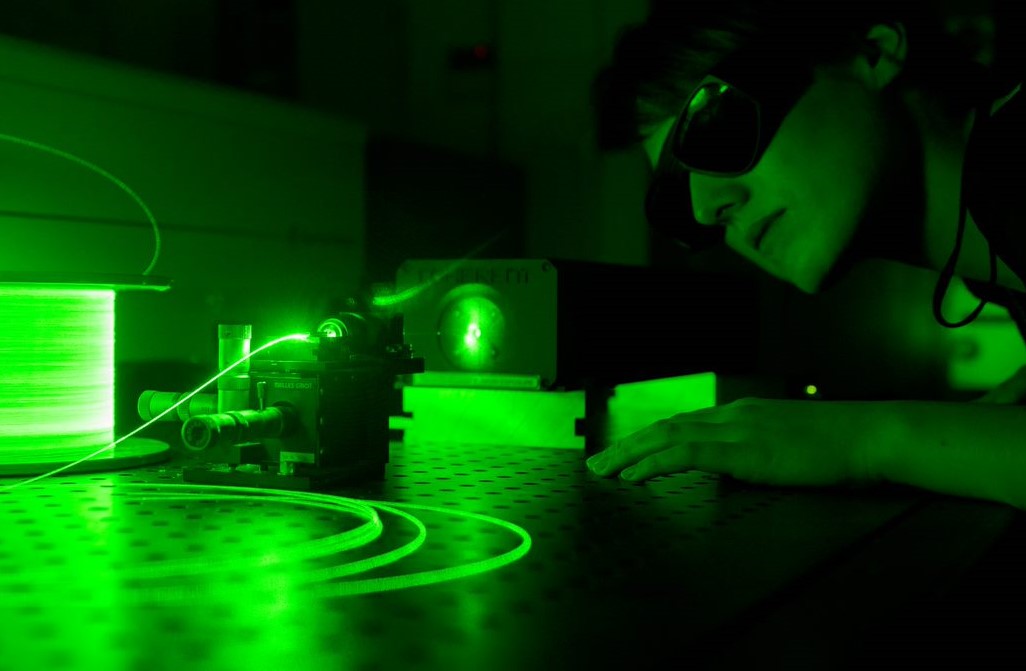 Laser light guided by optical fibre