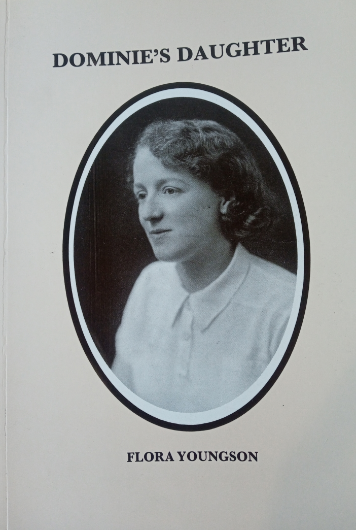 Photo of Flora Youngson as a young woman, wearing a white blouse