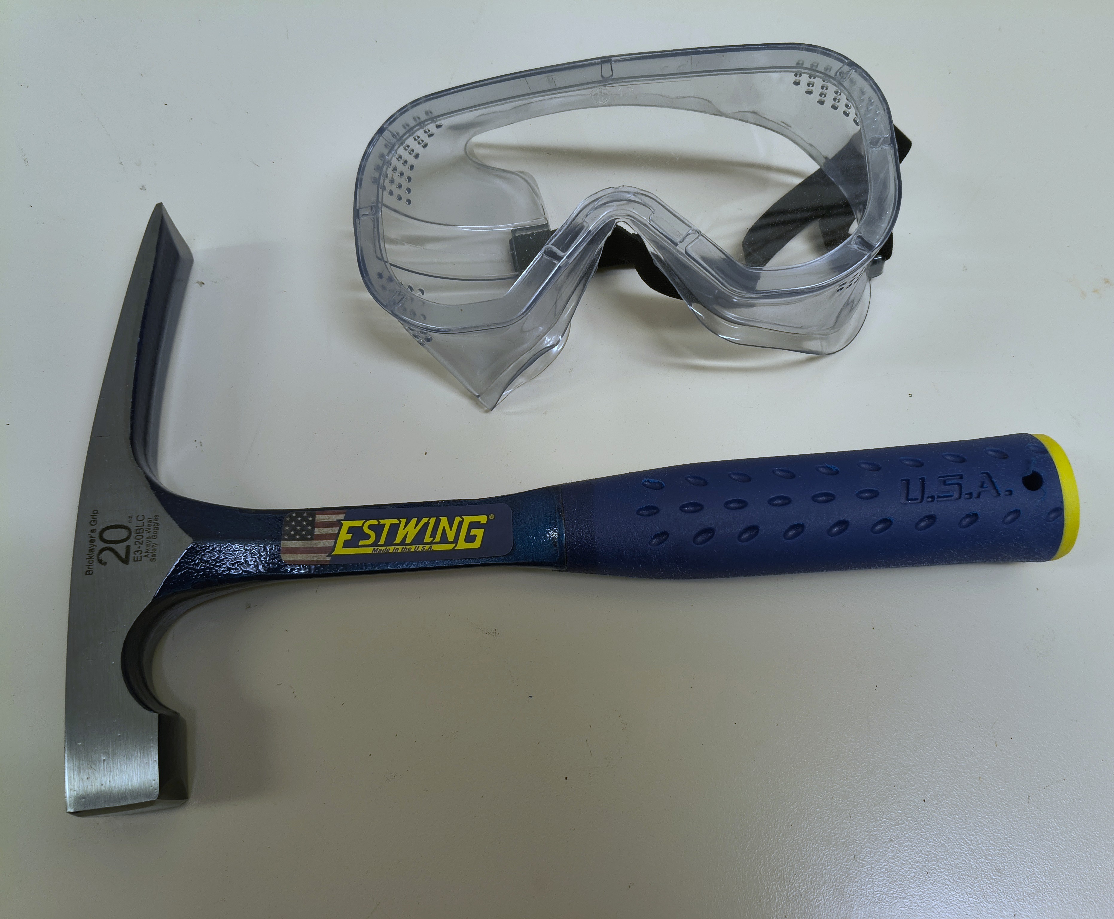 Geological Hammer and goggles