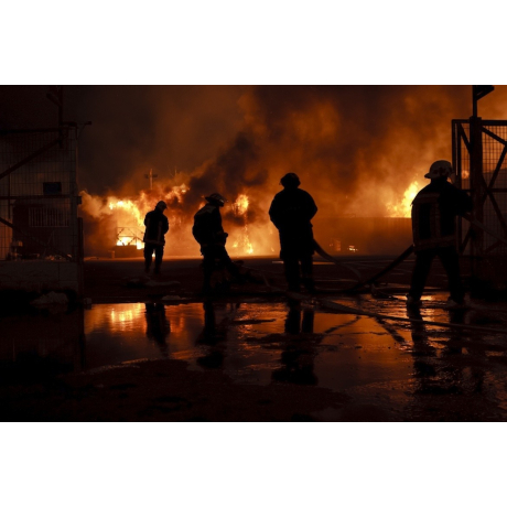 Firefighters tackling a blaze