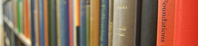 Close up of book spines on shelf