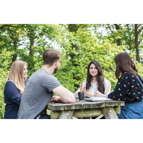 Group of students sitting and talking