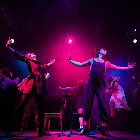 Young people dancing on stage