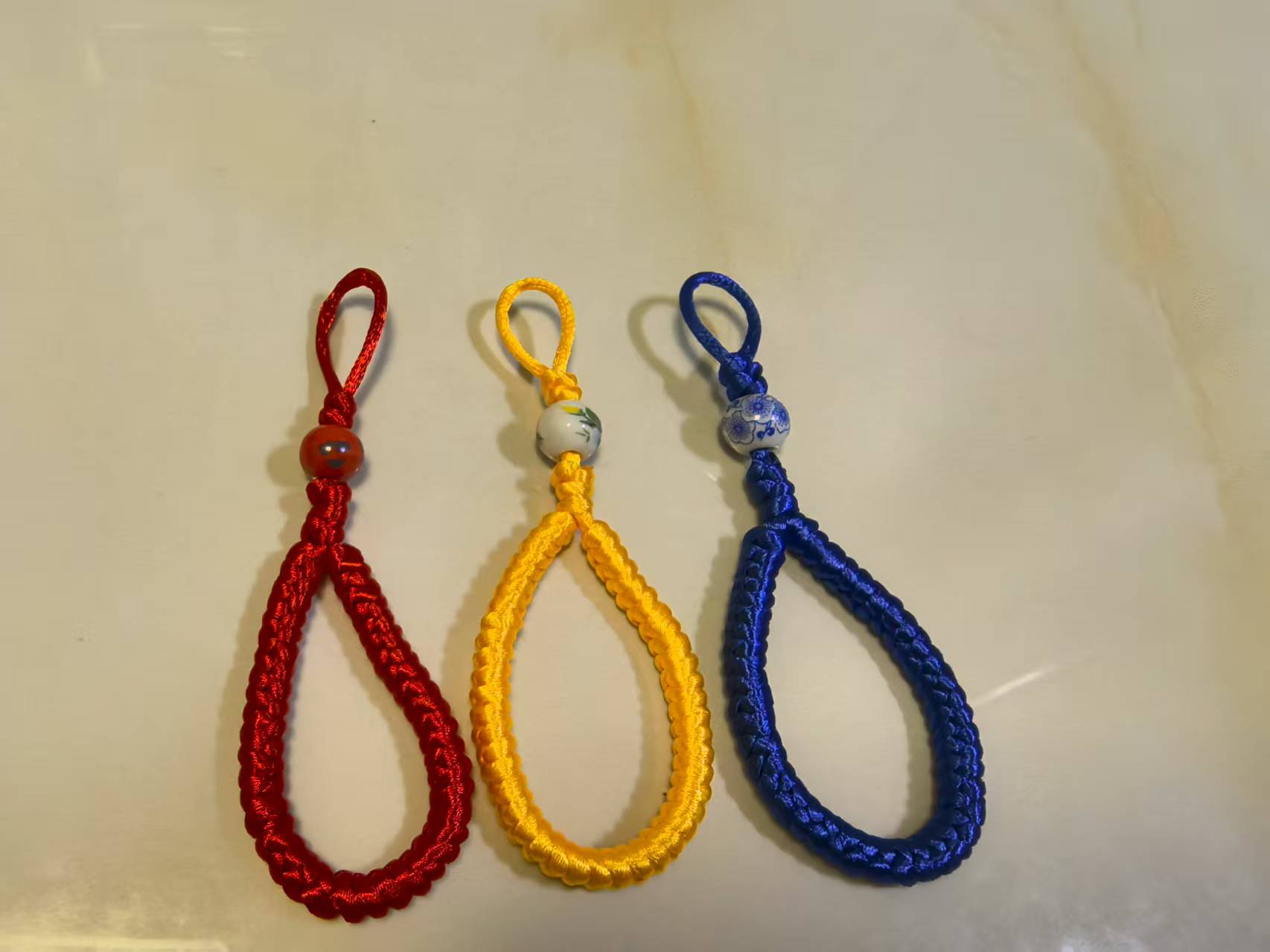 A red, yellow and blue Chinese knot