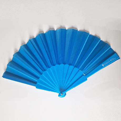 Image of bright blue fan folded out ready for use