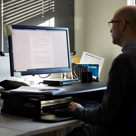 A student accessing online learning course content on PC