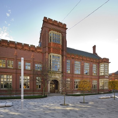 image of Sutherland Building- red brick building with trees outside
