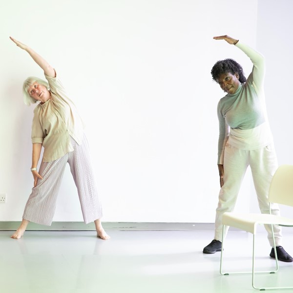 Two older ladies dancing
