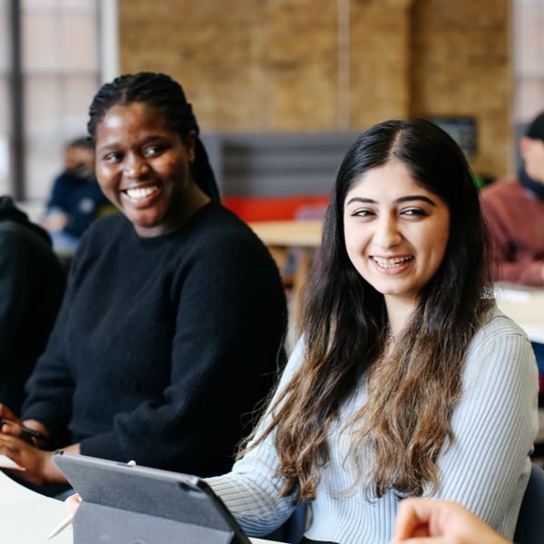 smiling students in a classroom