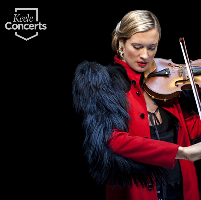 female violinist wearing bright red coat with feathered black shoulderpads.