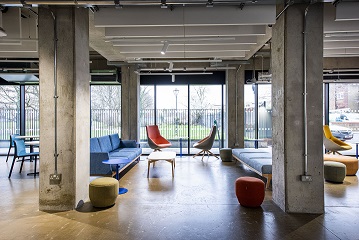 Image of The Hub's Gallery Space with soft seating set out. Credit ITC