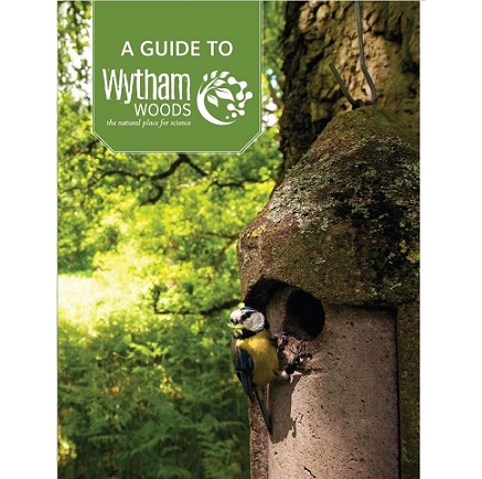 The front cover of the guidebook, showing a blue tit at a nest box, with the title 'A Guide to Wytham Woods'
