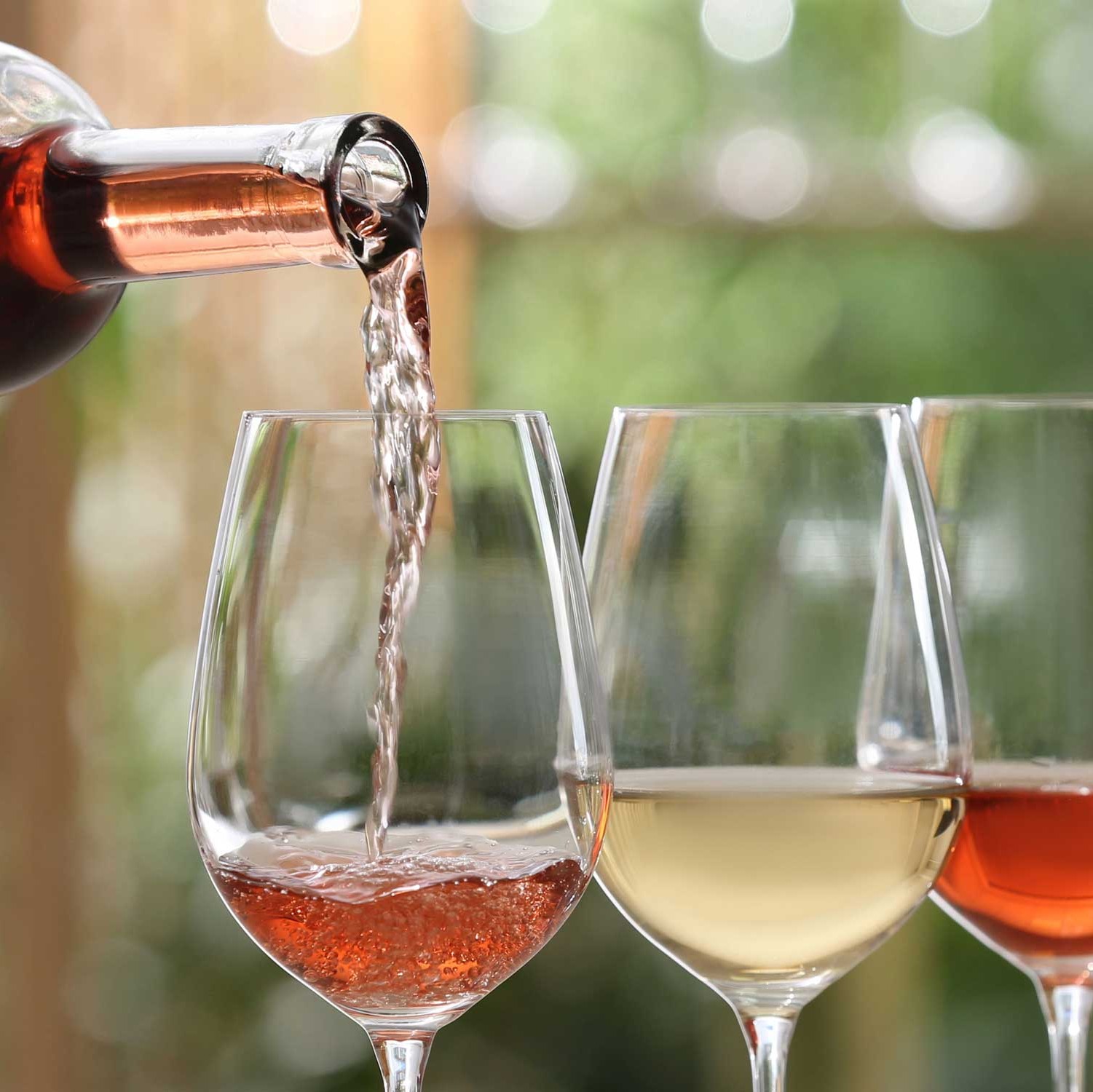 glass of wine being poured