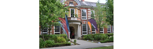 Avenue Campus with Flags Flying outside