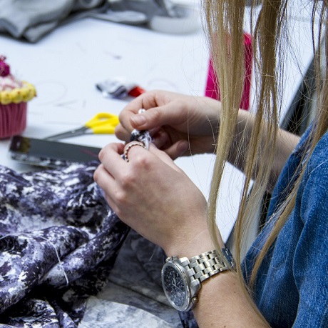 Students working in the fashion studios
