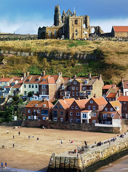 Whitby Abbey and sea front houses